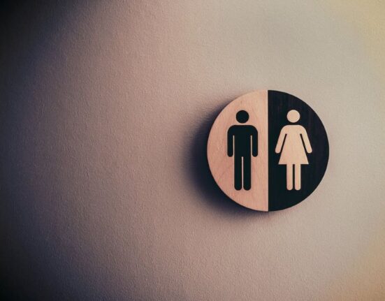 Men's and women's restroom signs.